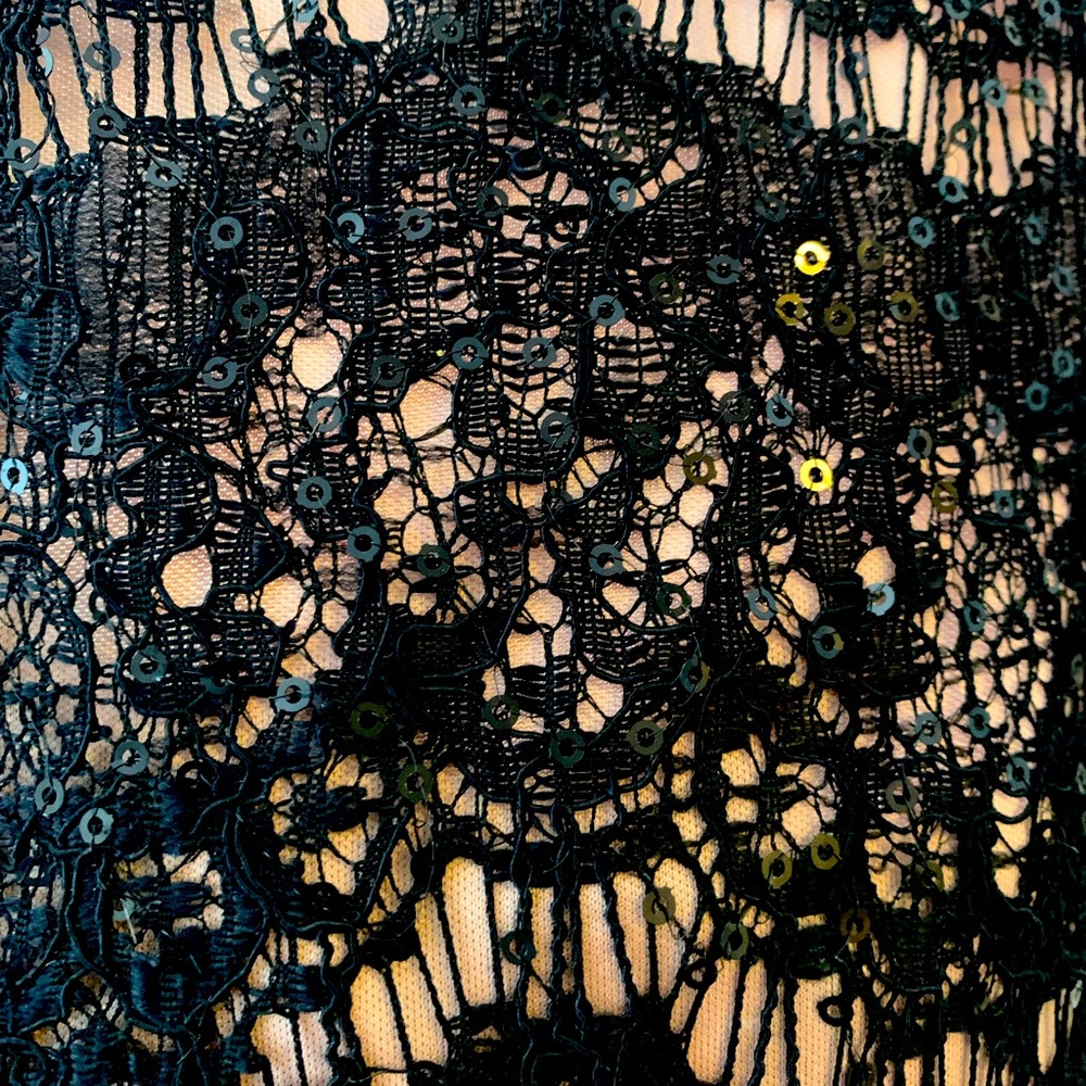 Black lace with sequin detail throughout size 8
